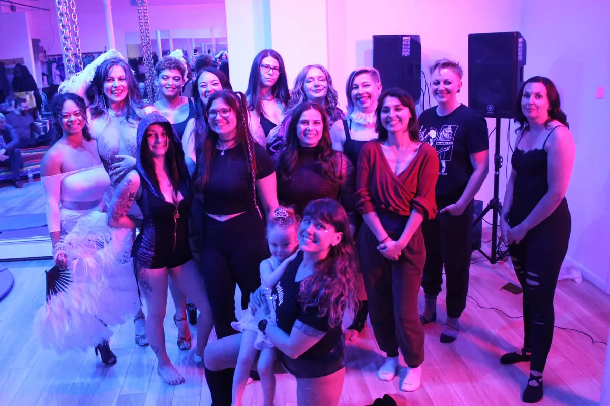 Flexibility in Flight students and instructors celebrating together in the studio